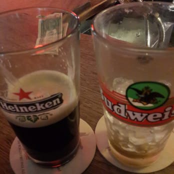 Larry's Pub - Guinness and LongIsland ice tea in heine and bud glasses at Larry's Pub. Yeah baby. - Sports Bars Near Me - Valley Stream, New York