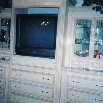 Wood Master Homes - entertainment center with glass doors - General Contractors Near Me
