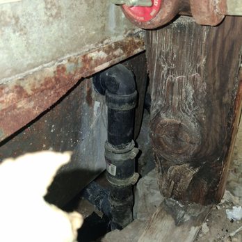 Western Colony Inn - Hole in wall revealing rusted pipes and another room through a Crack in the wall - Hotels Near Me - Ogden, Utah Western Colony Inn - Hole in wall revealing rusted pipes and another room through a Crack in the wall - Hotels Near Me - Ogden, Utah