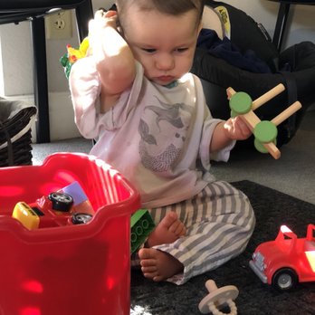 Network Chiropractic Wellness Center - Franki playing in the waiting room! Such a family friendly practice! - Chiropractors Near Me - Santa Cruz, California