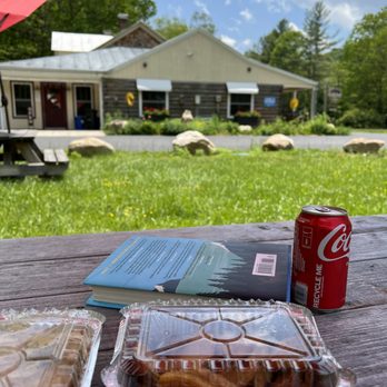 White's Wayside - a picnic table with a can of coke and a hot dog - American Near Me - Churchville, Virginia White's Wayside - a picnic table with a can of coke and a hot dog - American Near Me - Churchville, Virginia