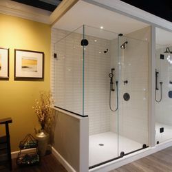 Oasis Shower Doors - Oasis shower doors has both sliding and hinged shower door solutions on display.