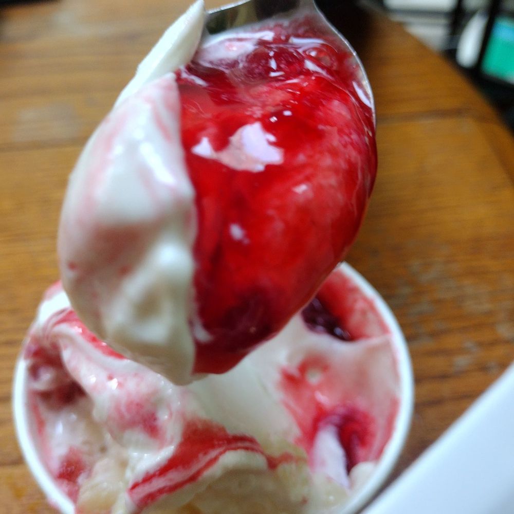 Banana soft serve with strawberry and pineapple topping