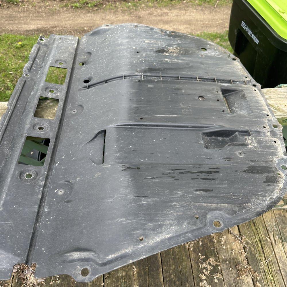This is the dust shield that I'm talking about. This oil change was done yesterday. At least it didn't fall off on the road.