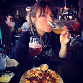 Bay Local Eatery - Enjoying our sorbet mimosas and smothered tots! - New American Near Me - Virginia Beach, Virginia