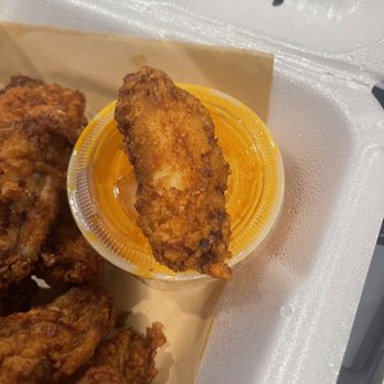 Hooters - Look at how small Hooters wings are!!!  They are horrible for the price we payed. - American Near Me - Charlotte, North Carolina
