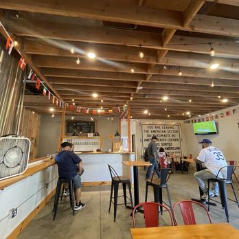 Two Coast Brewing - Lounging area with two screens - Breweries Near Me - Gardena, California