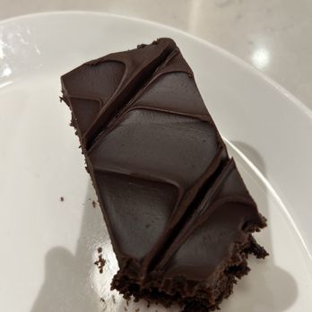 Atlantis Manhattan Deli - 1/2 of a Brownie I already took a bite of.  They are huge - Delis Near Me - RENO, Nevada