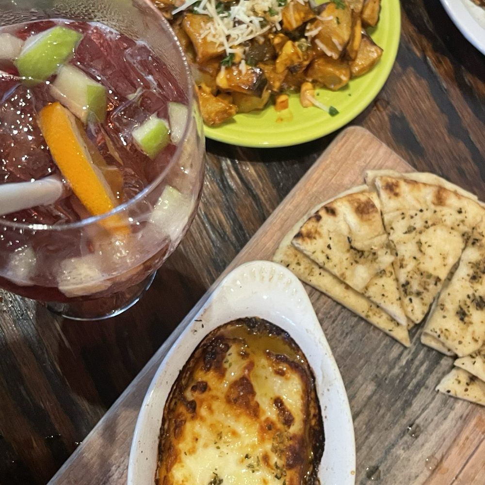 Santiago's Bodega - Saganaki patatas bravas - Tapas Bars Near Me - Key West, Florida Santiago's Bodega - Saganaki patatas bravas - Tapas Bars Near Me - Key West, Florida