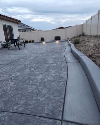 Stamped Concrete - Elevate your space with personalized patterns and textures that blend durability with design. Stamped Concrete - Elevate your space with personalized patterns and textures that blend durability with design.