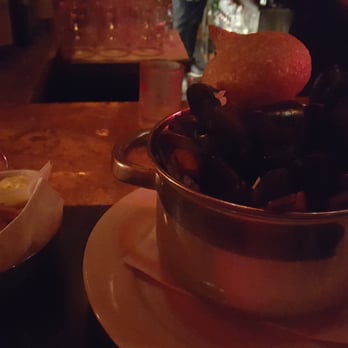 Monk's Cafe - Monk's mussels (flavored with "Gueuze, fumé, garlic & parsley" but really I tasted garlic butter goodness. Comes with most amazing frites - Pubs Near Me - Philadelphia, Pennsylvania