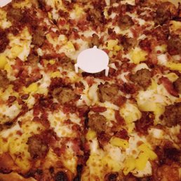 Bullrider pizza. Sausage, chicken, bacon, pineapple, bbq sauce. Bullrider pizza. Sausage, chicken, bacon, pineapple, bbq sauce.