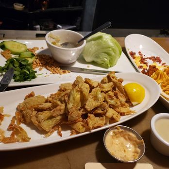 The Hornet - chicken curry wraps, deviled eggs and artichokes - American Near Me - Denver, Colorado