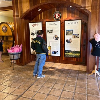 Sutter Home Winery - Someone reading up on the history of the winery - Wineries Near Me - Saint Helena, California Sutter Home Winery - Someone reading up on the history of the winery - Wineries Near Me - Saint Helena, California