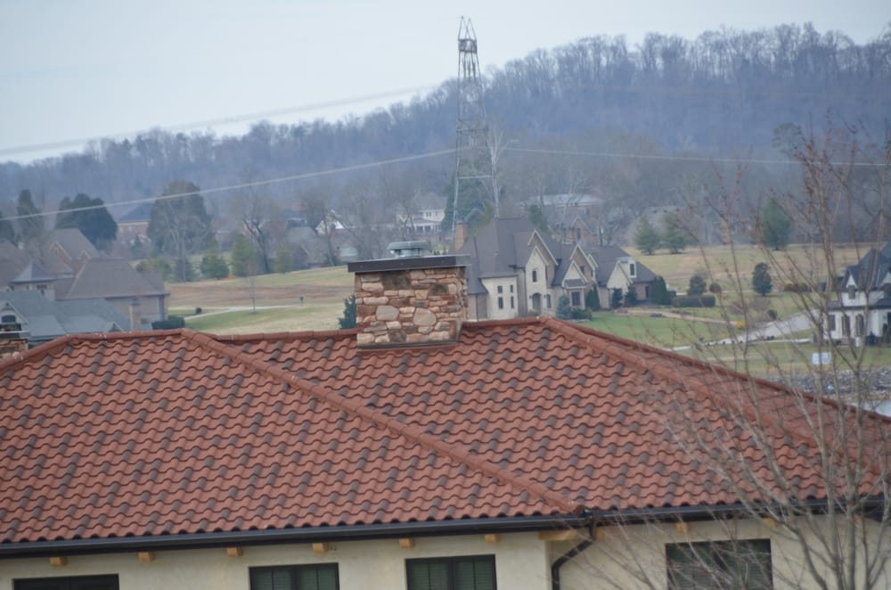 Slide of Champion Roofing Services