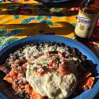 El Moose - Chilaquiles Rojos with Carne Asada and two eggs. Delicious! - Mexican Near Me - Seattle, Washington