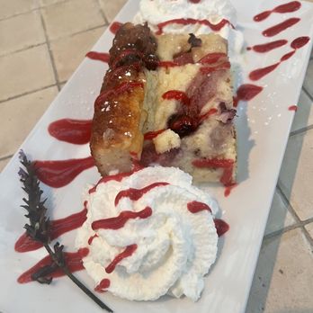 Indigo Moon - Warm lemon berry bread pudding with raspberry sauce - New American Near Me - Cambria, California Indigo Moon - Warm lemon berry bread pudding with raspberry sauce - New American Near Me - Cambria, California