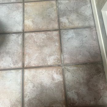 Kings Cleaning - The floors in the hallway bathroom after deep cleaning - Home Cleaning Near Me