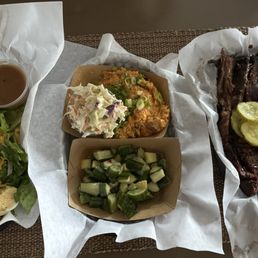 Brisket, side of sweet potato salad, sweet and sour pickle salad, coleslaw, and a house salad! We walked away very happy! Brisket, side of sweet potato salad, sweet and sour pickle salad, coleslaw, and a house salad! We walked away very happy!