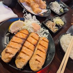 Grilled salmon and a side order of shrimp tempura. Grilled salmon and a side order of shrimp tempura.