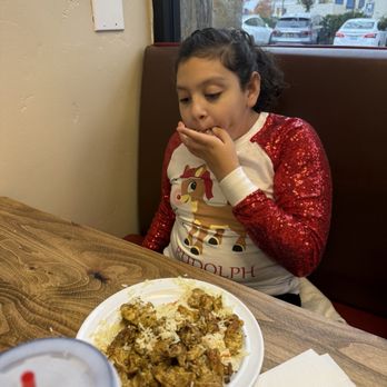 Wally's Cafe - My nine-year-old digging in - Mediterranean Near Me - Rocklin, California Wally's Cafe - My nine-year-old digging in - Mediterranean Near Me - Rocklin, California