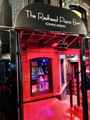 Redhead Piano Bar by null