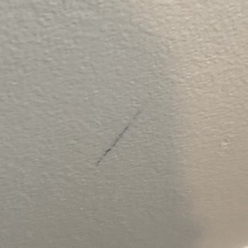 Professional Relocating - Scratch in wall - Movers Near Me Professional Relocating - Scratch in wall - Movers Near Me