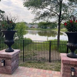 Rush Home Improvement - Fence in the backyard looking out at our lake.