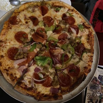 Zax Restaurant - Ramon (partially baked pizza) - Pizza Near Me - Moab, Utah Zax Restaurant - Ramon (partially baked pizza) - Pizza Near Me - Moab, Utah