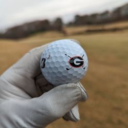 UGA Golf Course - Bridgestone Golf golf ball with the UGA Golf logo.