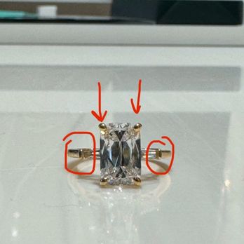 Brilliant Earth - Photo in store showing all issues with the ring from side stone to uneven prongs - Accessories Near Me - Santa Monica, California Brilliant Earth - Photo in store showing all issues with the ring from side stone to uneven prongs - Accessories Near Me - Santa Monica, California