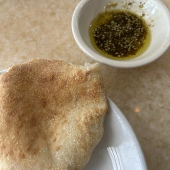 Lebanese Taverna - Pita olive oil with Mediterranean spices - Mediterranean Near Me - Baltimore, Maryland Lebanese Taverna - Pita olive oil with Mediterranean spices - Mediterranean Near Me - Baltimore, Maryland