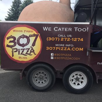 307 Pizza - a food truck with a large piece of pizza on the trailer - Food Trucks Near Me 307 Pizza - a food truck with a large piece of pizza on the trailer - Food Trucks Near Me