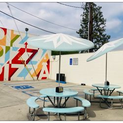 Tomato Pie Pizza Joint - Back outdoor tables.