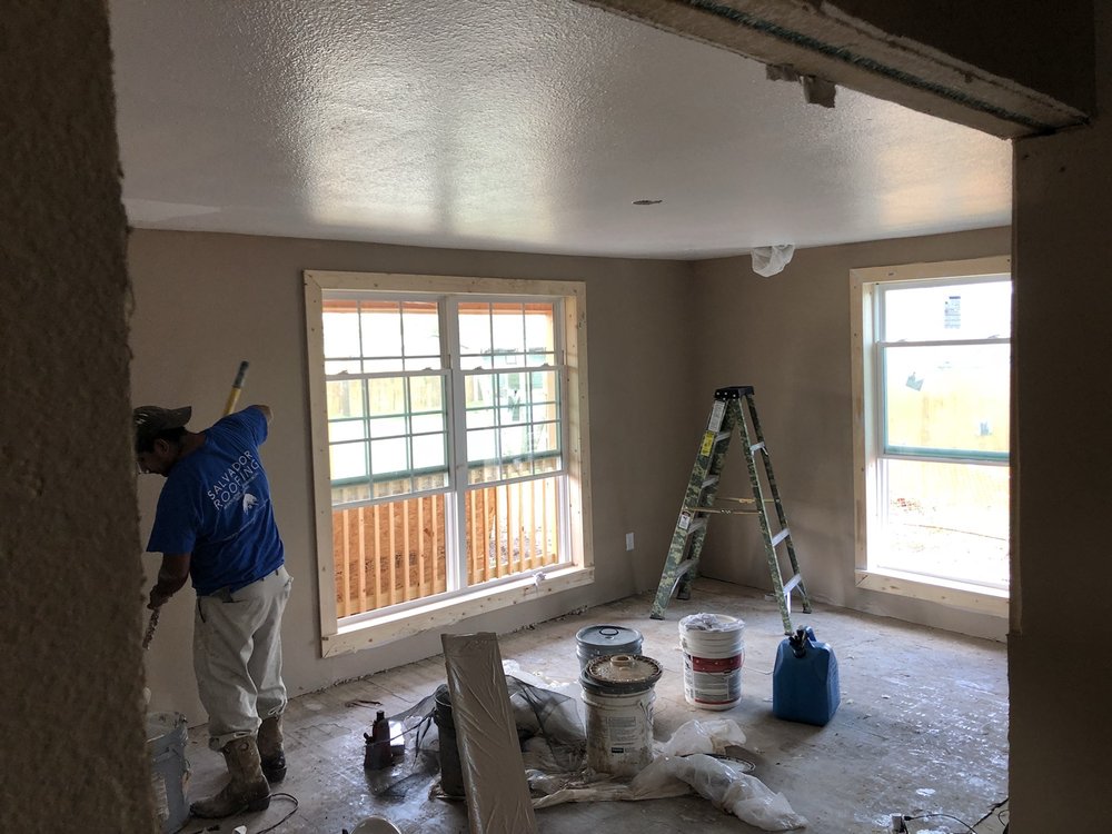 Slide of Salvador Roofing Services