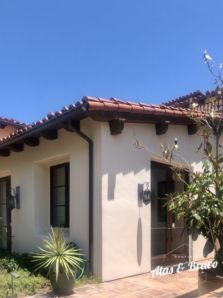 Slide of Alas & Bravo Roofing Company