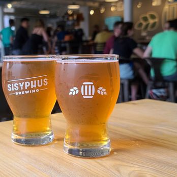 Sisyphus Brewing - two glasses of beer on a table - Breweries Near Me - Minneapolis, Minnesota
