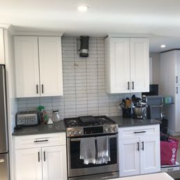 a kitchen with stainless steel appliances
