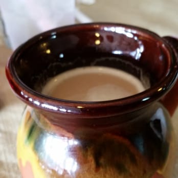 Casa Yari - Cafe con leche. I'm digging the clay cups. - Latin American Near Me - Chicago, Illinois