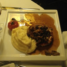Rolled, Stuffed Pork Loin with mushrroms and mashed potatoes