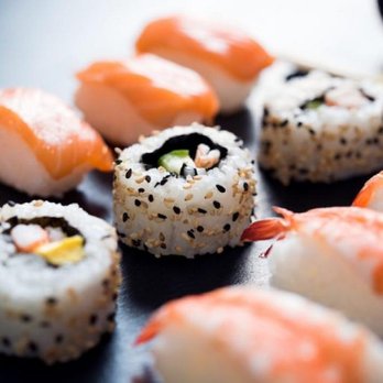 Shogun Shreveport - a variety of sushi on a black plate - Japanese Near Me - Shreveport, Louisiana Shogun Shreveport - a variety of sushi on a black plate - Japanese Near Me - Shreveport, Louisiana