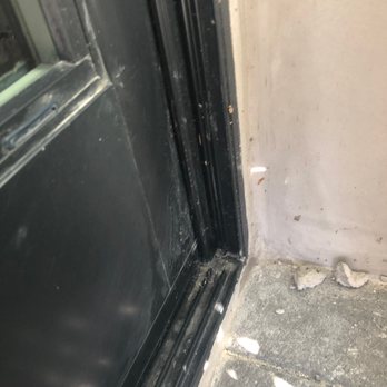 Angel's window cleaning - Tracks & frames not cleaned up.  Cement all over the pavers. - Window Washing Near Me - Orange, California