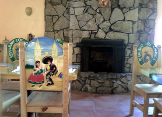 Photo of La Espuela Mexican Restaurant & Cantina - Mountain View, CA, US. The painted chairbacks