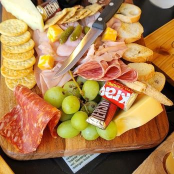 In Contrada Vineyard and Kitchen - The charcuterie board has various offerings and is quite tasty. - Wine Tasting Room Near Me - San Antonio, Texas