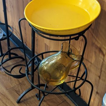Drelyse African Restaurant - Traditional table side hand rinse - African Near Me - Columbus, Ohio Drelyse African Restaurant - Traditional table side hand rinse - African Near Me - Columbus, Ohio