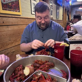 Uncle T's Oyster Bar - Matthew eating crawfish! - Bars Near Me - Scott, Louisiana