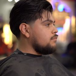 Rise N Grind Barbershop - Comb over with length plus taper