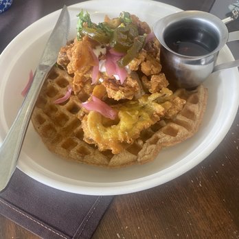 Veg Kitchen + Bar - Chickn' and chocolate chip waffle with jalapeño slices red onions and a white sauce, that comes with syrup, so darn good! - Vegan Near Me - Sacramento, California Veg Kitchen + Bar - Chickn' and chocolate chip waffle with jalapeño slices red onions and a white sauce, that comes with syrup, so darn good! - Vegan Near Me - Sacramento, California