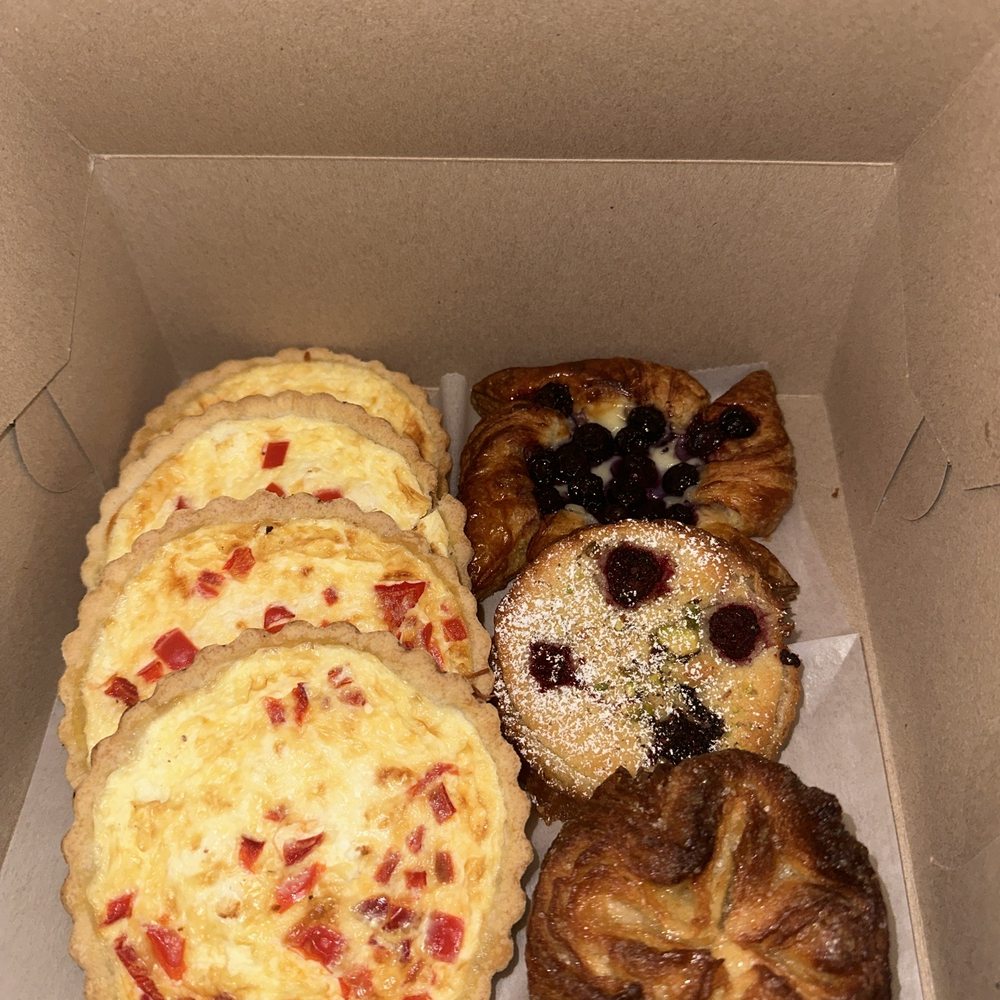Goat cheese & red pepper quiches, (right/top to bottom) blueberry croissant, bow stock fruit & nut & their Kouign amann!