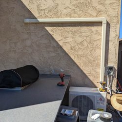 Sure Temp Air Conditioning - Outside wiring of mini split concealed